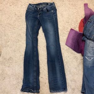 Blue jeans with rhinestone back pockets